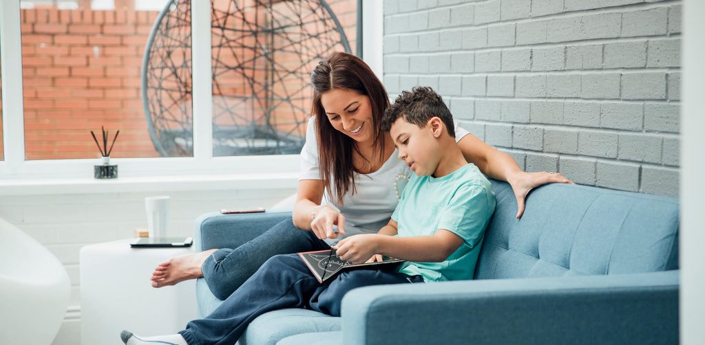 Mother and son in home extension