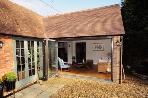 stables cottage bifolding doors open